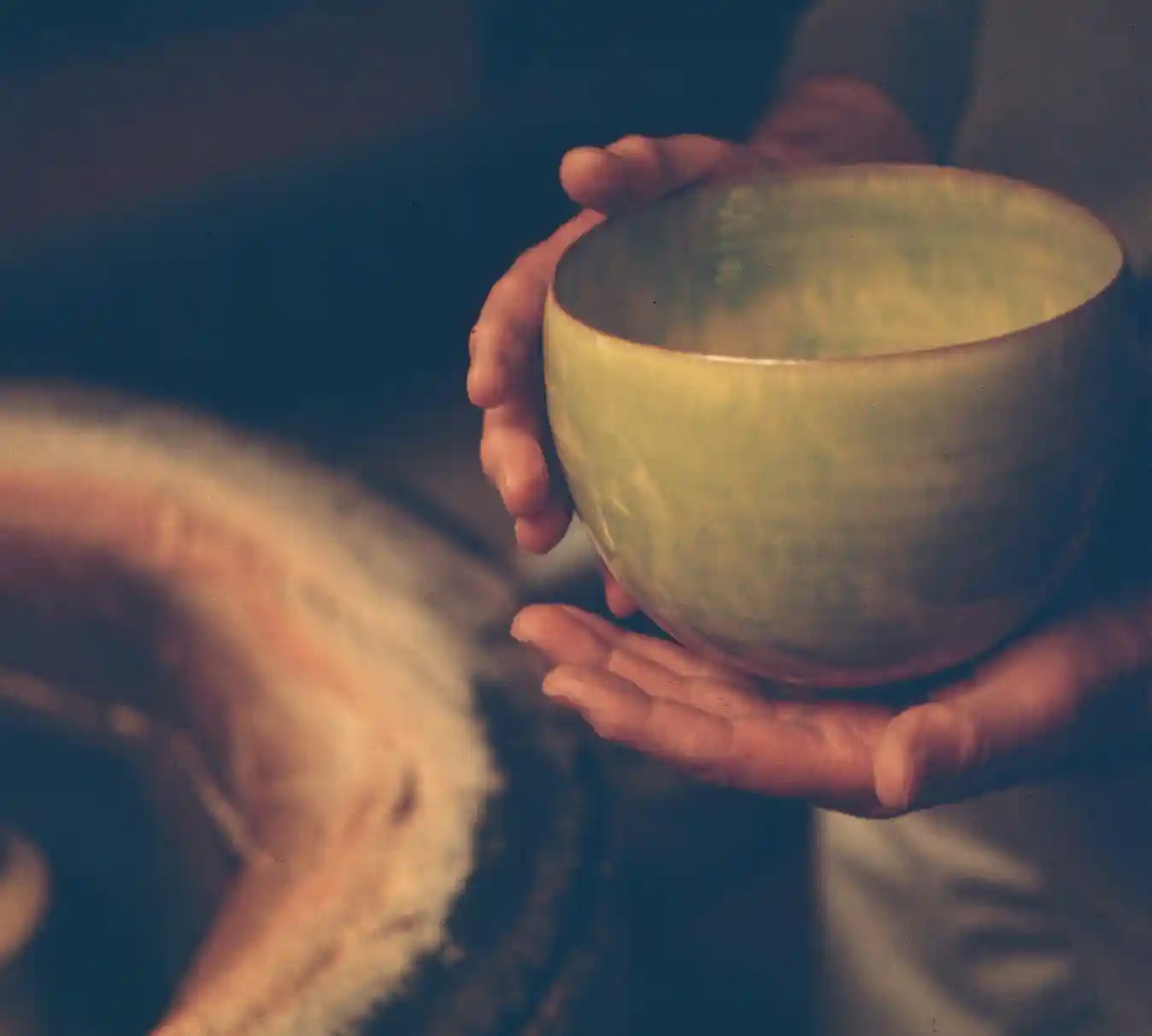 Otto holding a glazed bowl