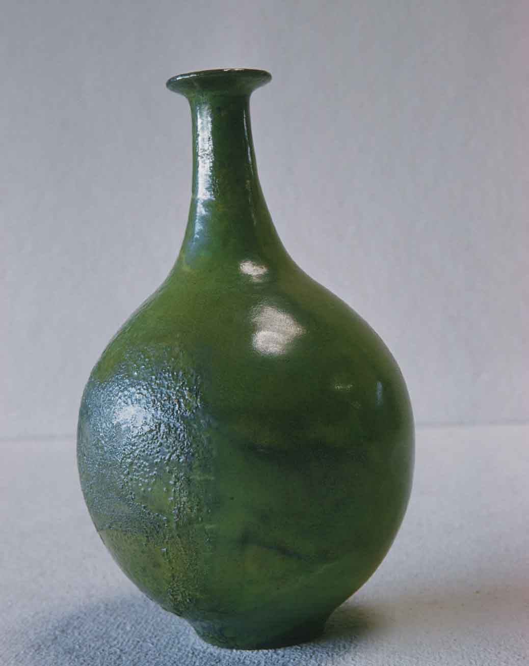 tall green vase