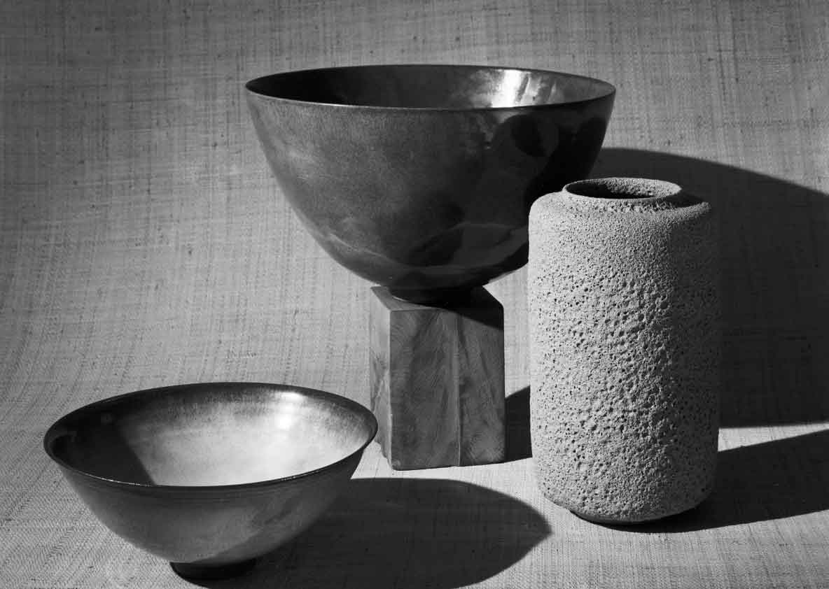 two bowls and one wide vase